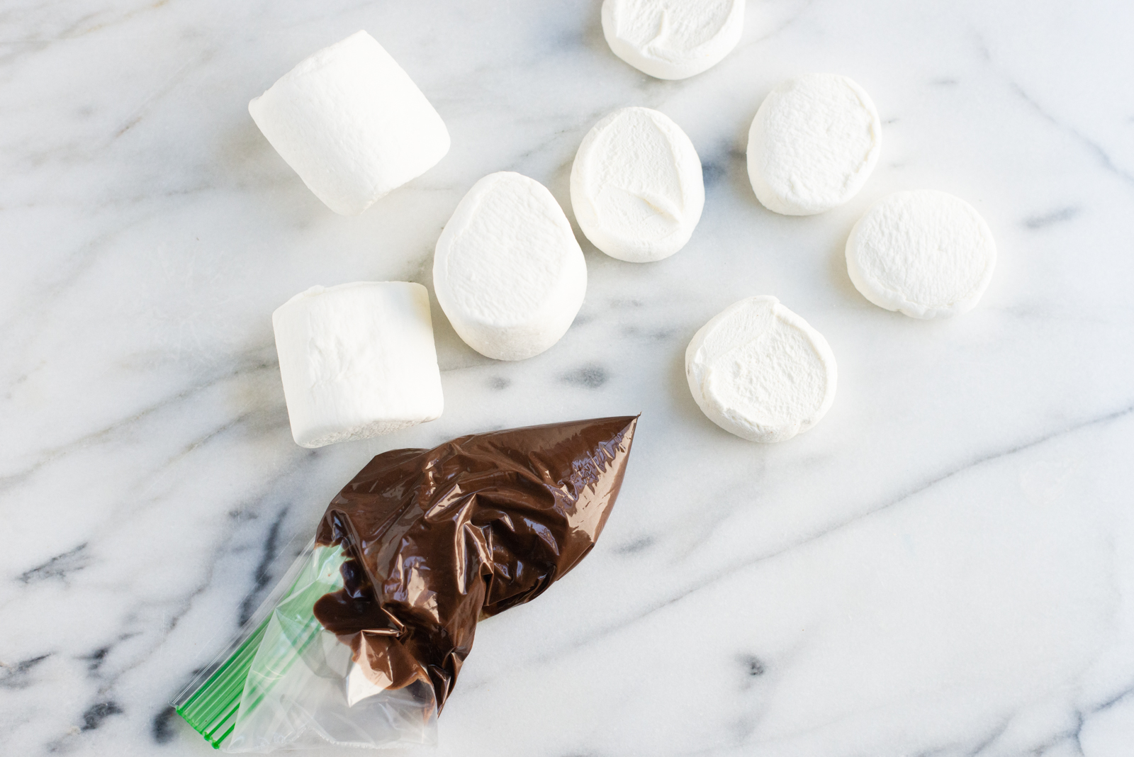 ziplock bag with chocolate candy melts for hot chocolate marshmallow snowmen