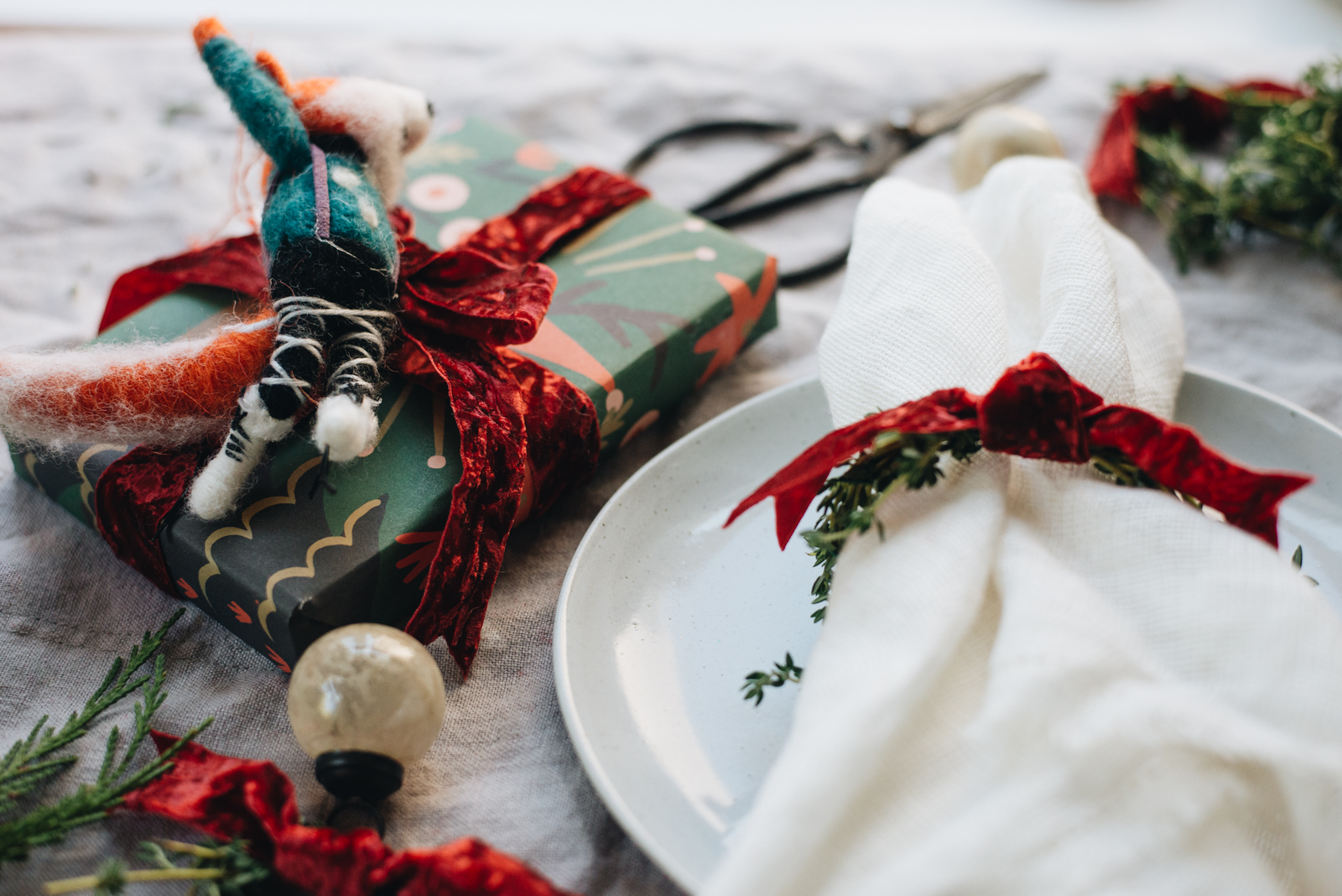 anthropologie felted fox with rifle paper present red velvet ribbon and thyme mini wreath