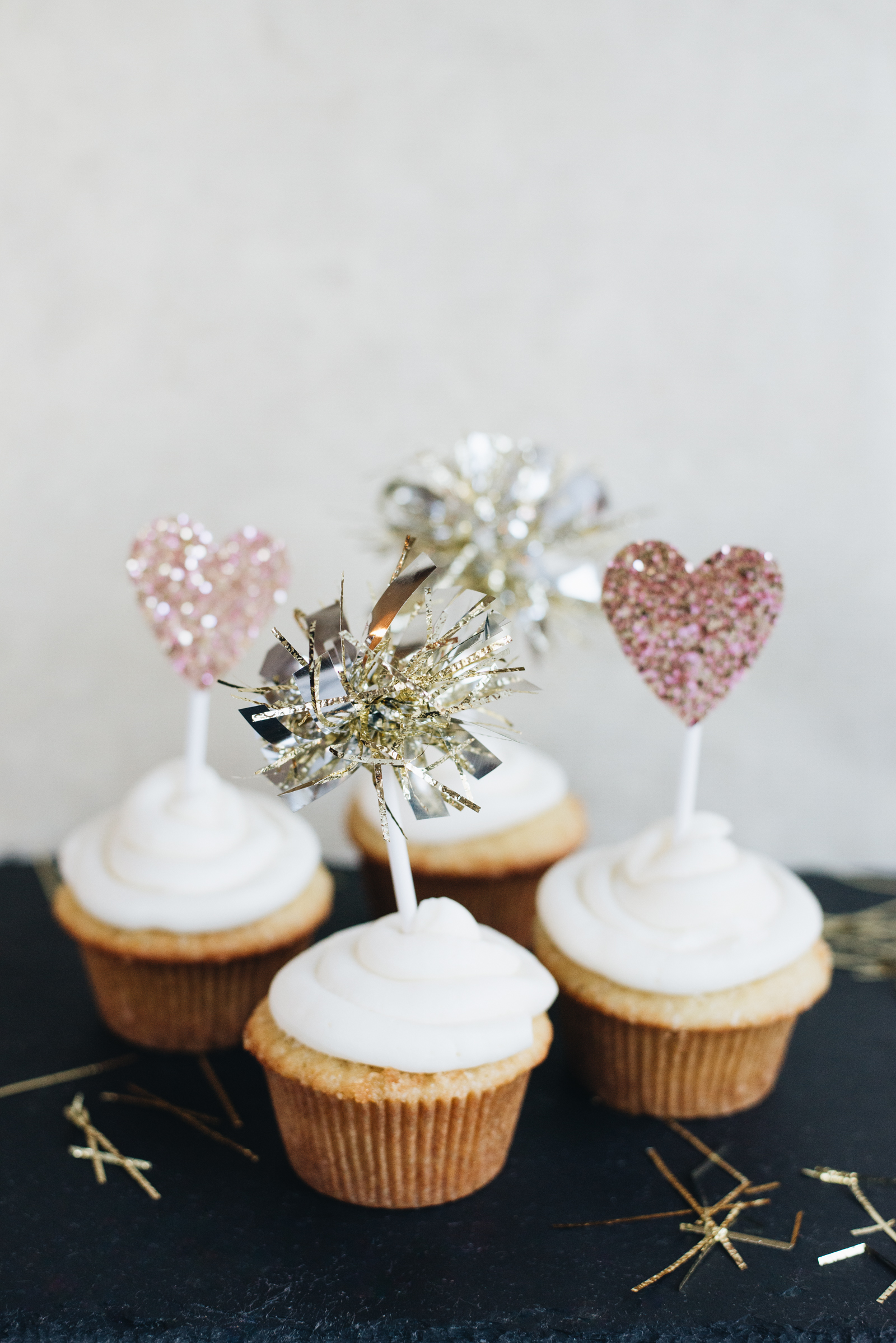 sparkly cupcake toppers on vanilla cupcakes Casey Wiegand