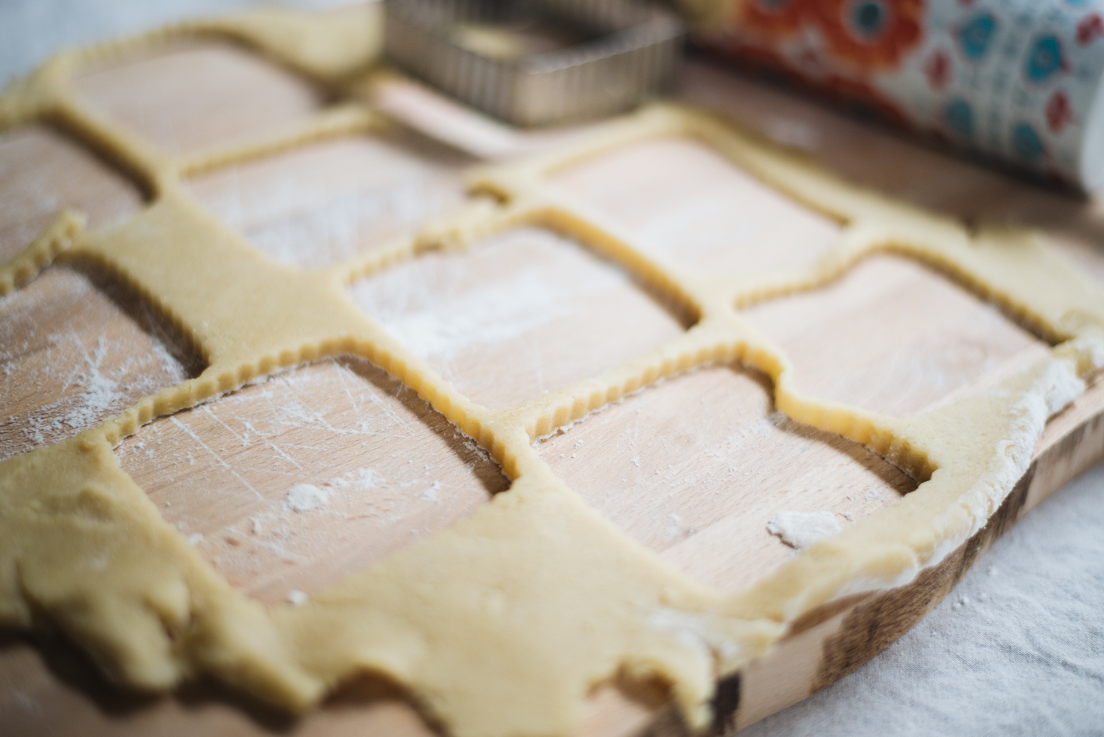 valentine's day kids embroidery glazed sugar cookie dough with rolling pin cut into squares casey wiegand