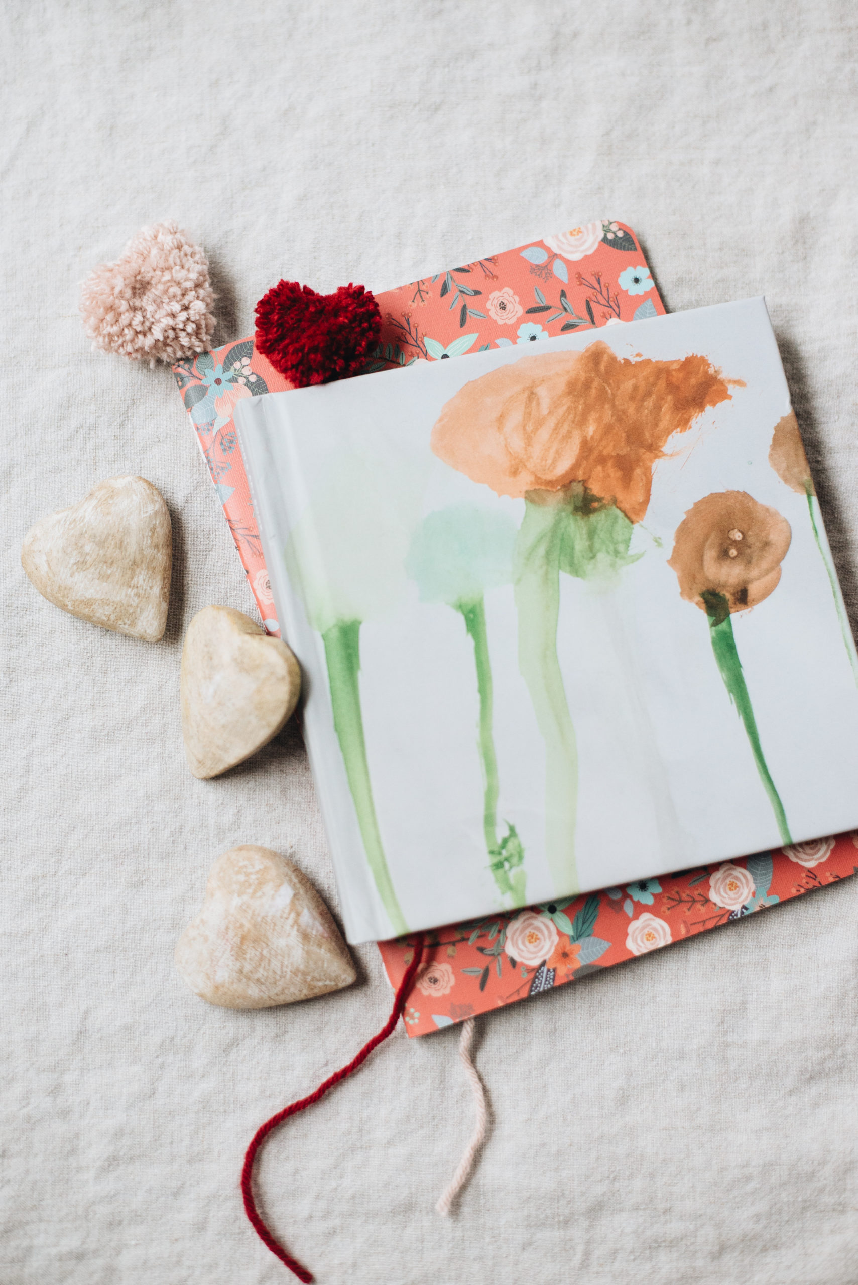 heart pom poms with books for valentine's day casey wiegand