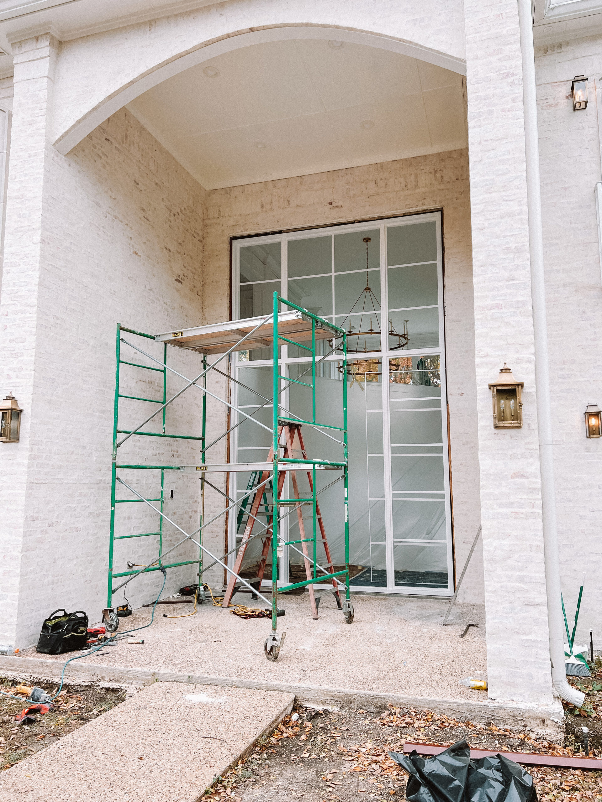 white metal frame glass door reveal